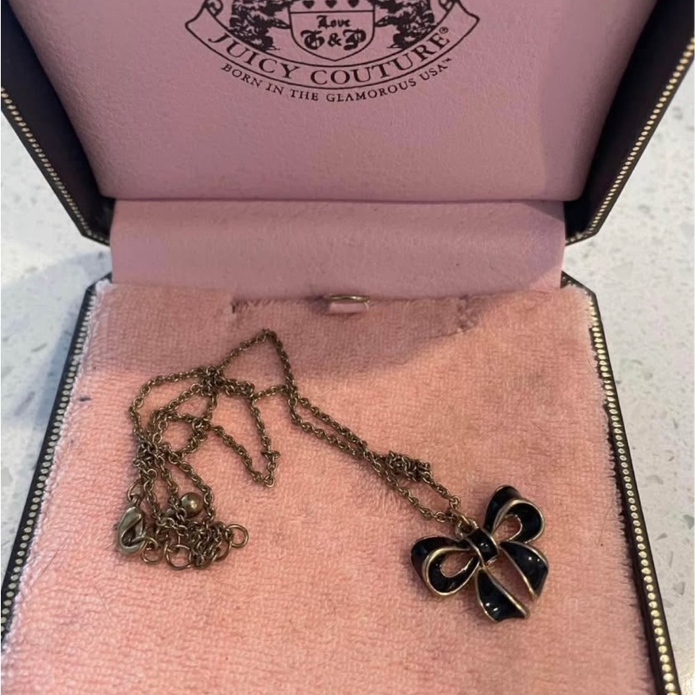 Juicy Couture Black and Gold Bow Necklace